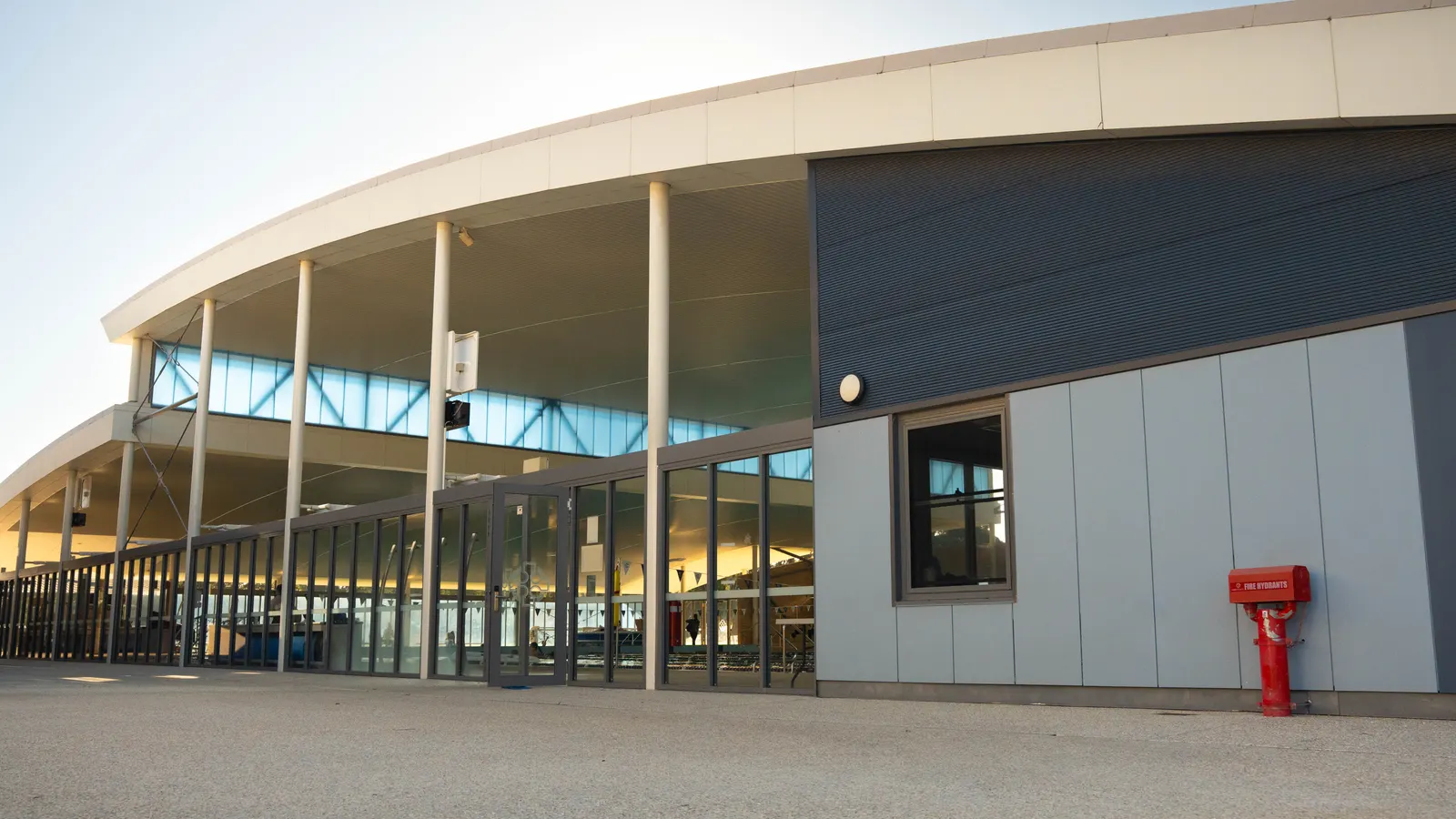 The exterior of the Jennifer Reilly Aquatic Centre at Corpus Christi College, seen from the car park