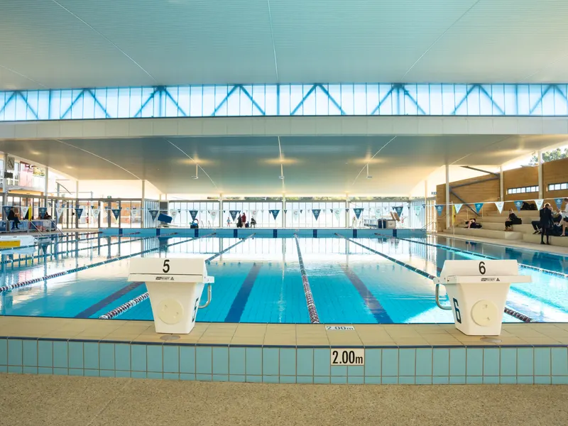 The starting blocks numbered five and six at the end of the main pool